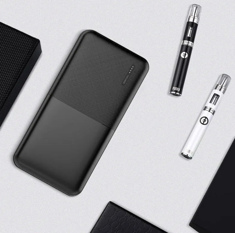 20000 mAh portable power bank with multiple USB ports in black or white colour measuring 140x69x26mm