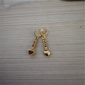 Women's heart-shaped fashion earrings with gold electroplated finish on alloy construction