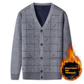Men's grey wool-lined cardigan with batwing sleeves on a hanger
