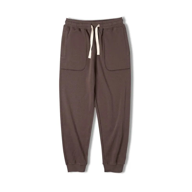 Retro men's tapered ankle-tied sweatpants in dark gray with drawstring elastic waist