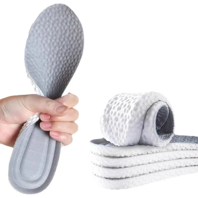 Grey trimmable deodorant sports insole made from PU foam on a white background.