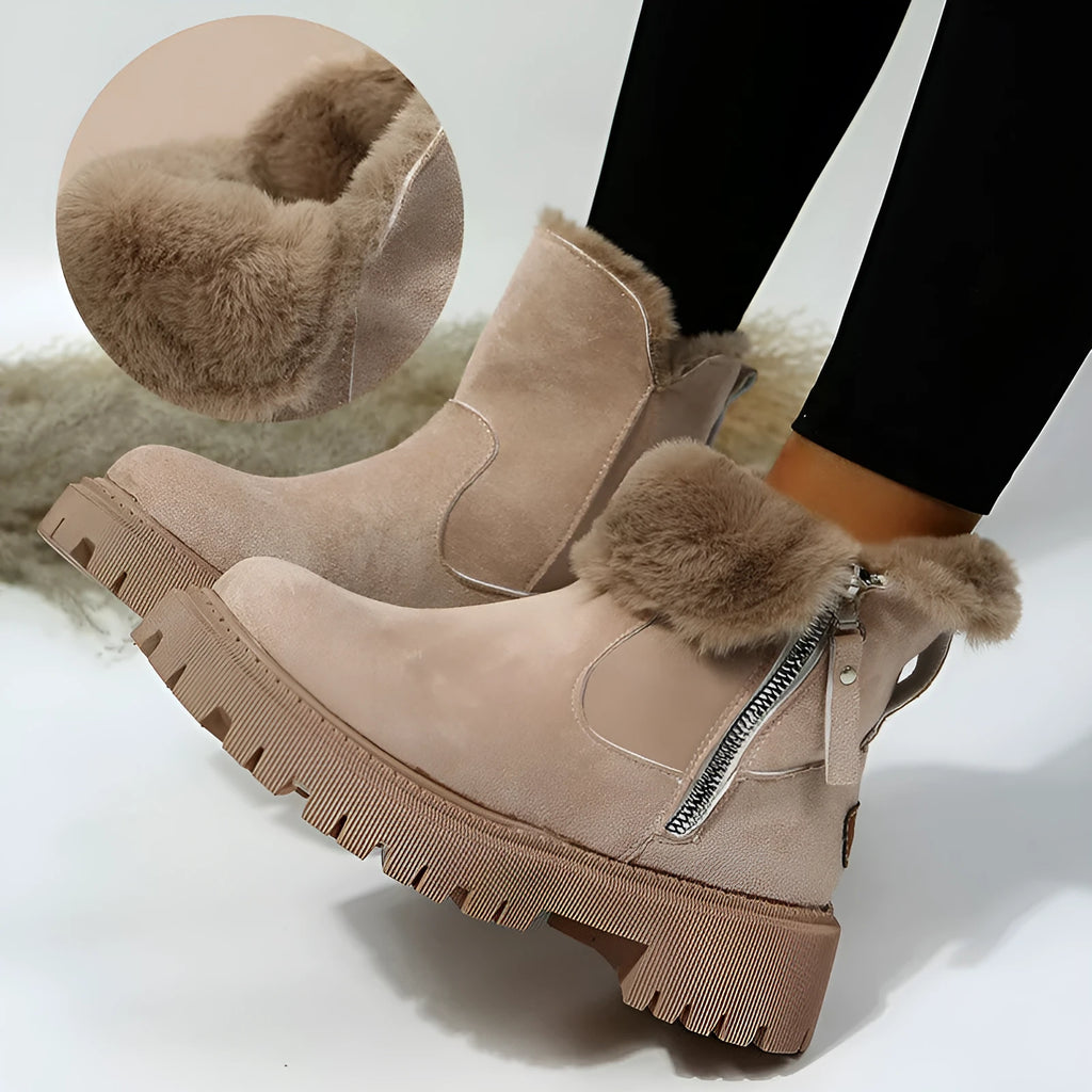 Women's black high-top faux suede snow boots with side zip and thick plush lining on a rubber sole.