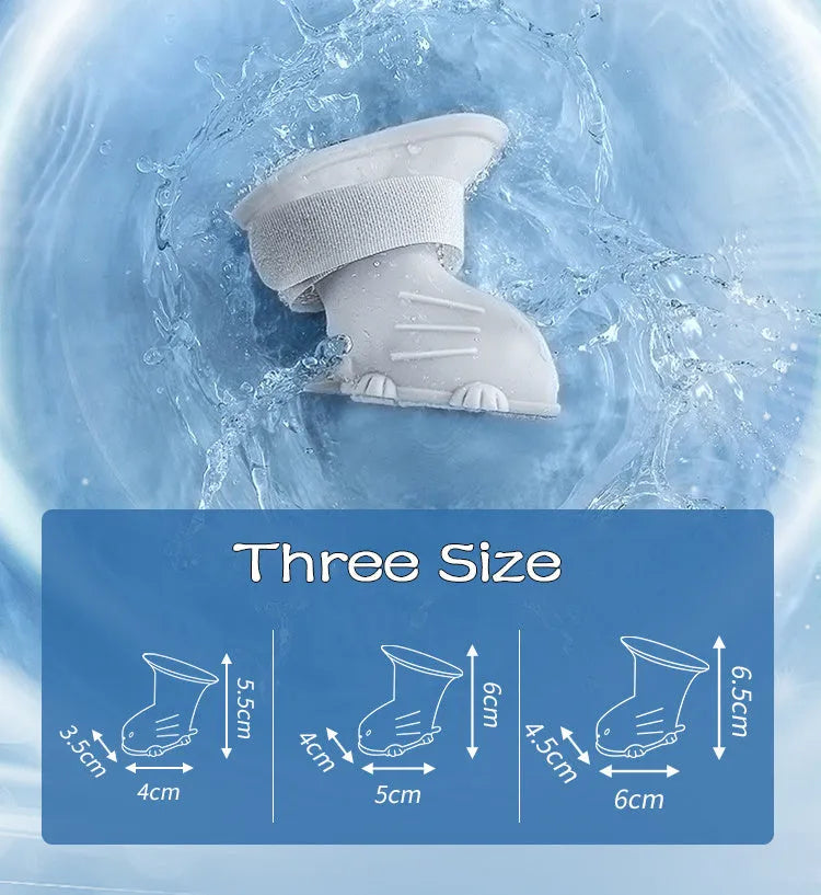Four waterproof silicone dog rain boots in blue, grey, light blue and pink on a white background