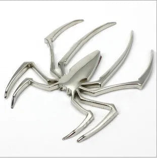 Zinc alloy 3D spider car bumper sticker in gold, silver, black, and red colours.