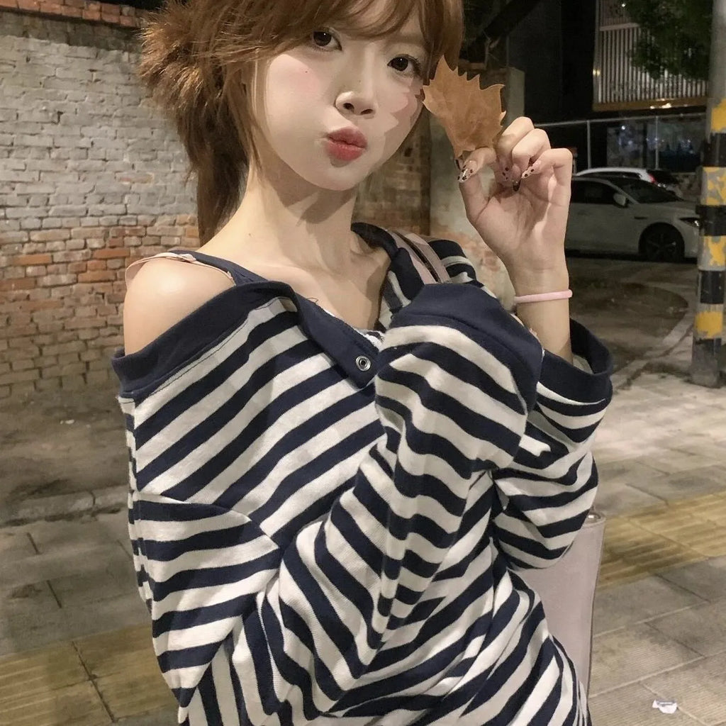 Dark blue women's oversized long-sleeve t-shirt with Korean style, embroidery, and stripe details.