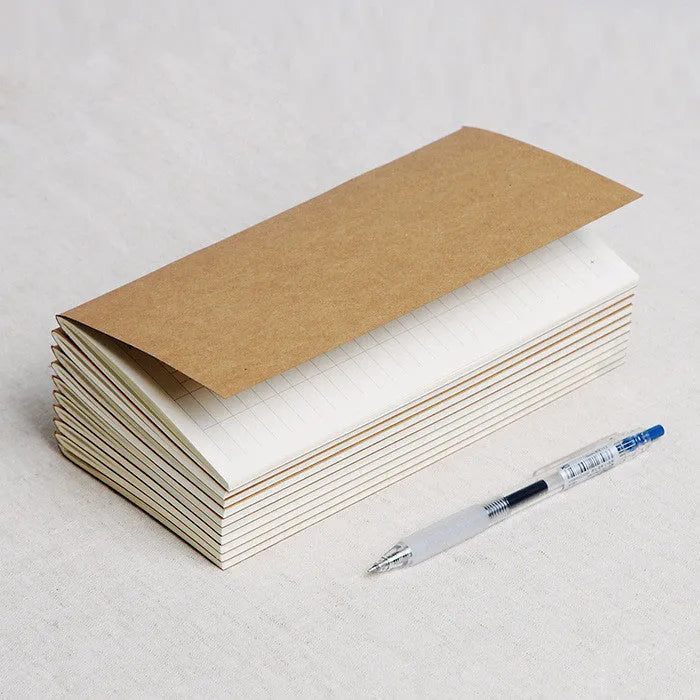 Travel cowhide diary refill notebook showing 11x21cm size and saddle stitch binding