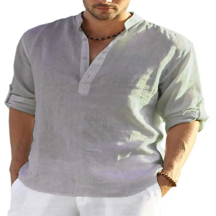Men's slim-fit long sleeve shirt in a cotton linen blend with a stand collar, shown in a light blue colour.
