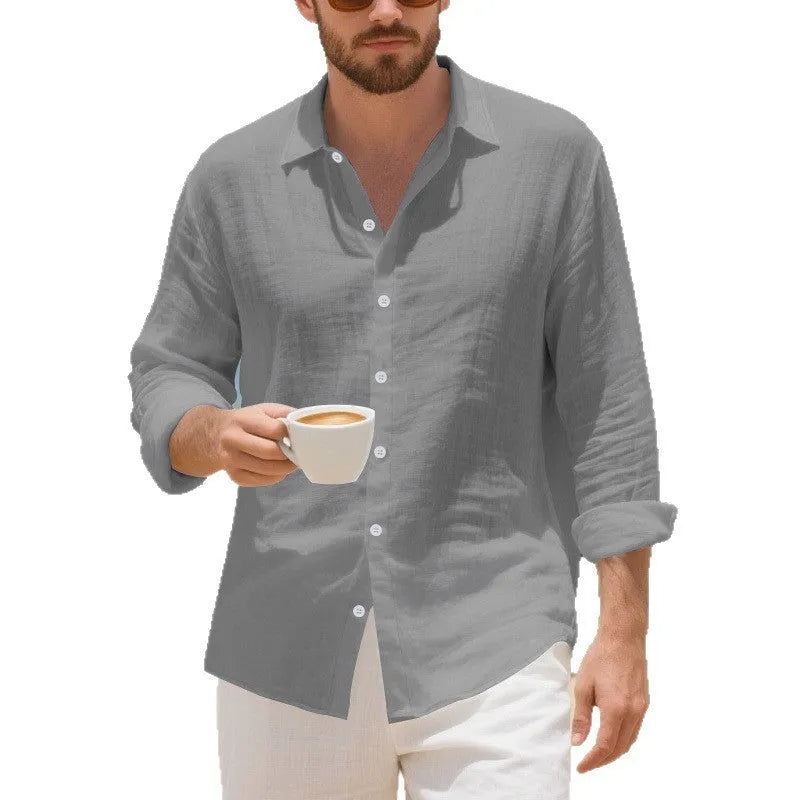 Man wearing a loose-fit light blue linen casual shirt with short sleeves