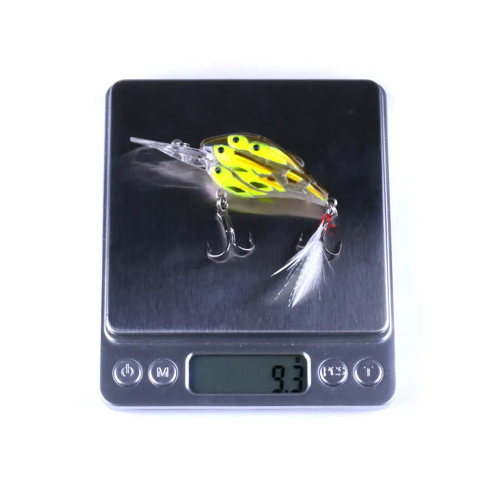 Set of nine multi-colour ABS plastic hard bait fishing lures with feather hooks.