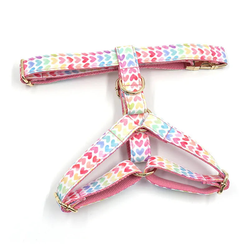Pink dog harness with gold buckle and heart-shaped stone decoration for small dogs