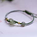 Hetian jade woven bracelet with flexible wire and hollow-out metallic elements