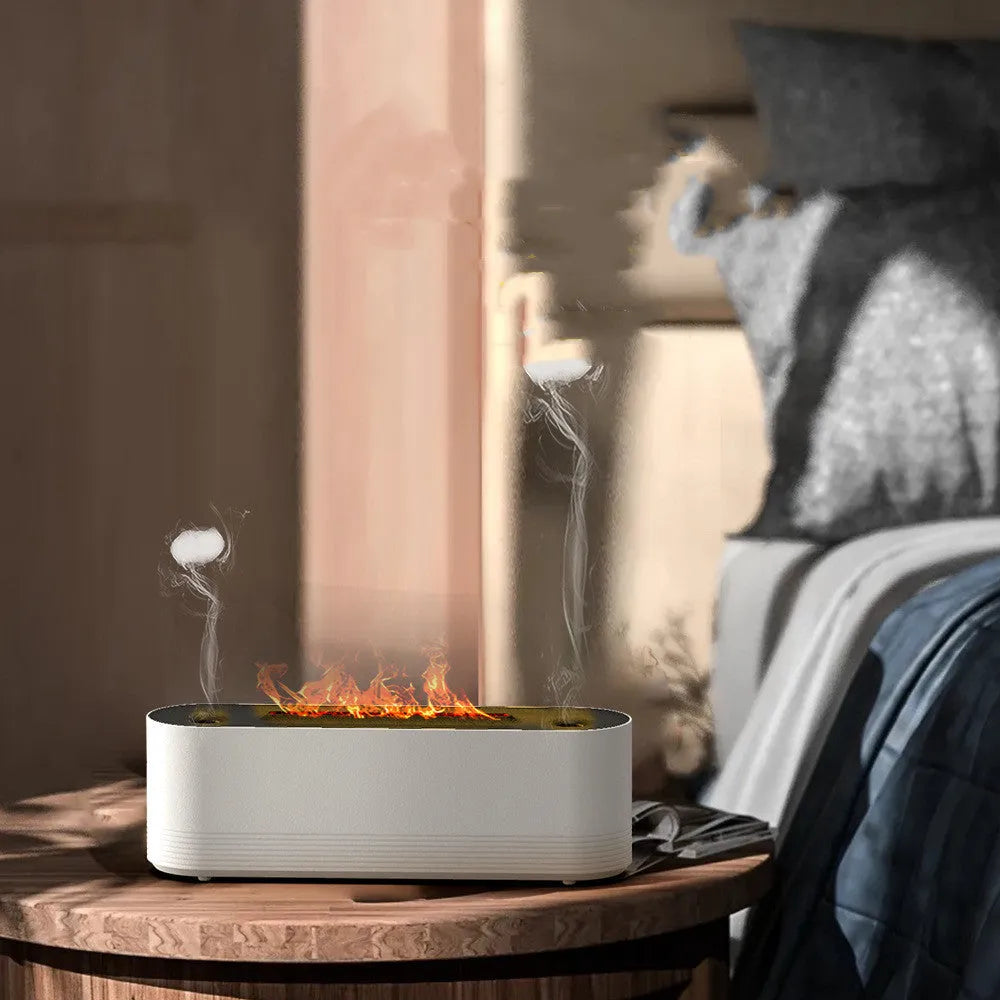 Black or white flame air humidifier with aroma diffuser and 7 colour LED lighting on table