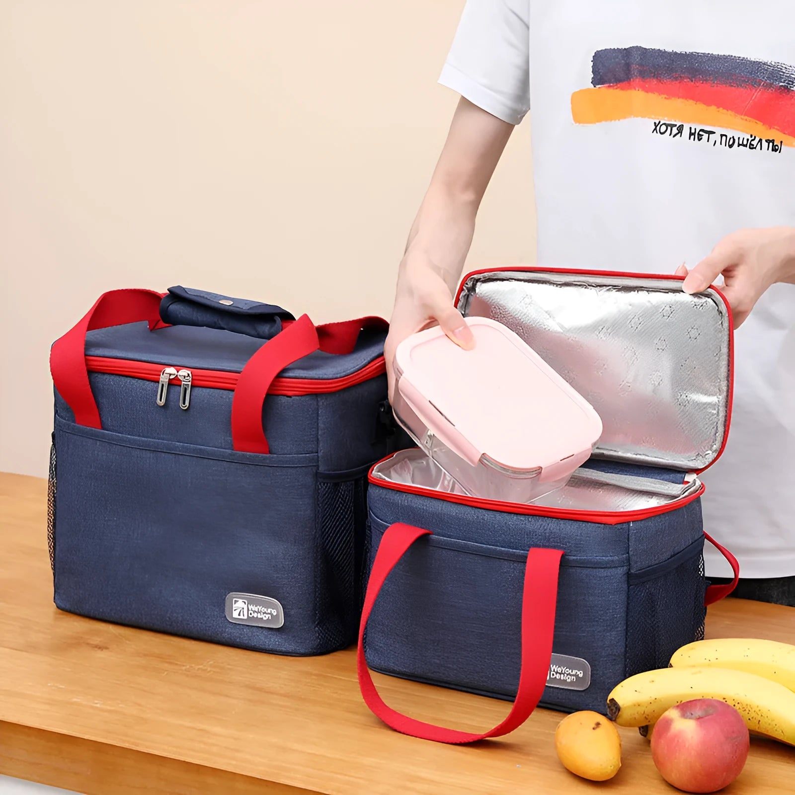 Insulated crossbody picnic bag with shoulder strap in grey colour showing 15 litre capacity