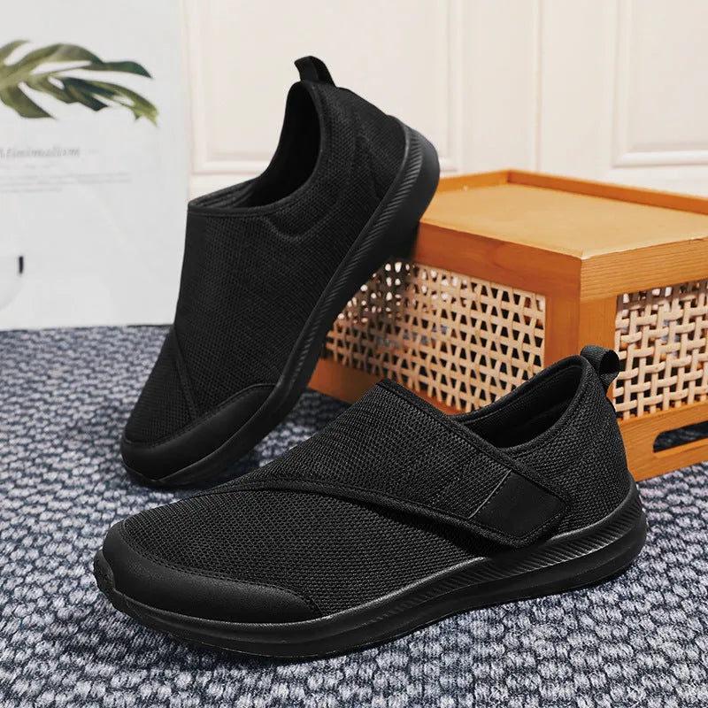 Summer walking shoes with mesh upper, flat heel, and Velcro fastening in black, grey, blue, or wine red.