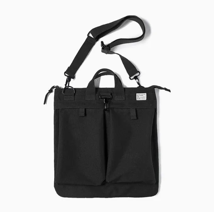 Marden Tooling canvas crossbody bag in military green with laptop compartment showing retro styling