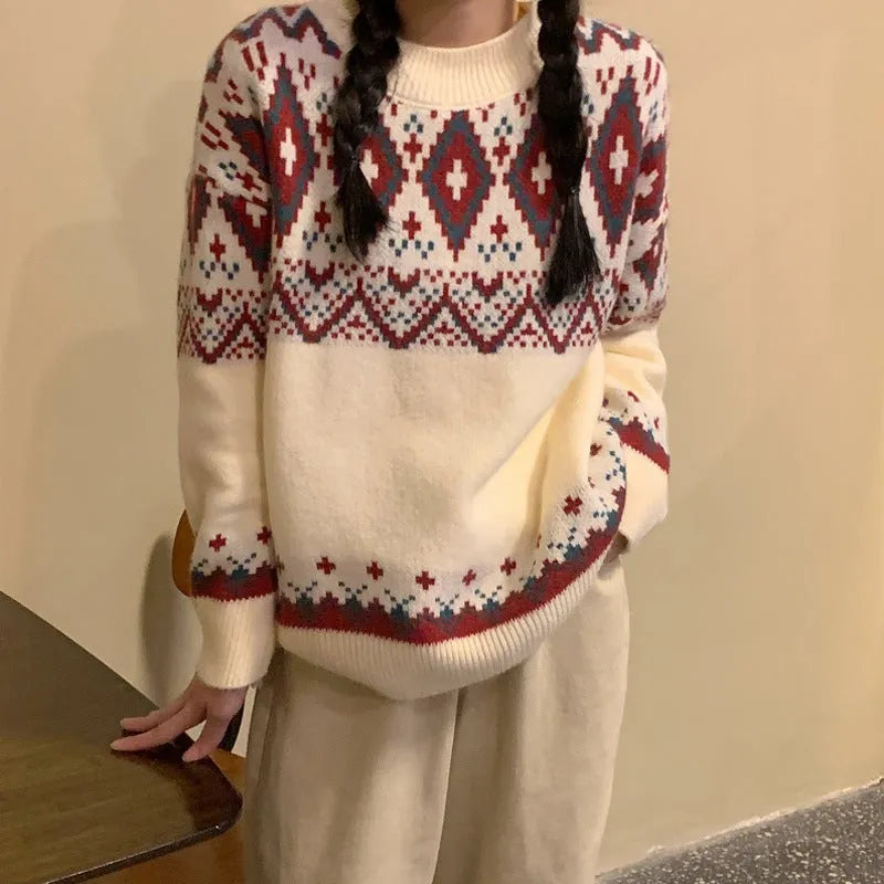 Red and white striped loose retro pullover knitted top on a hanger.