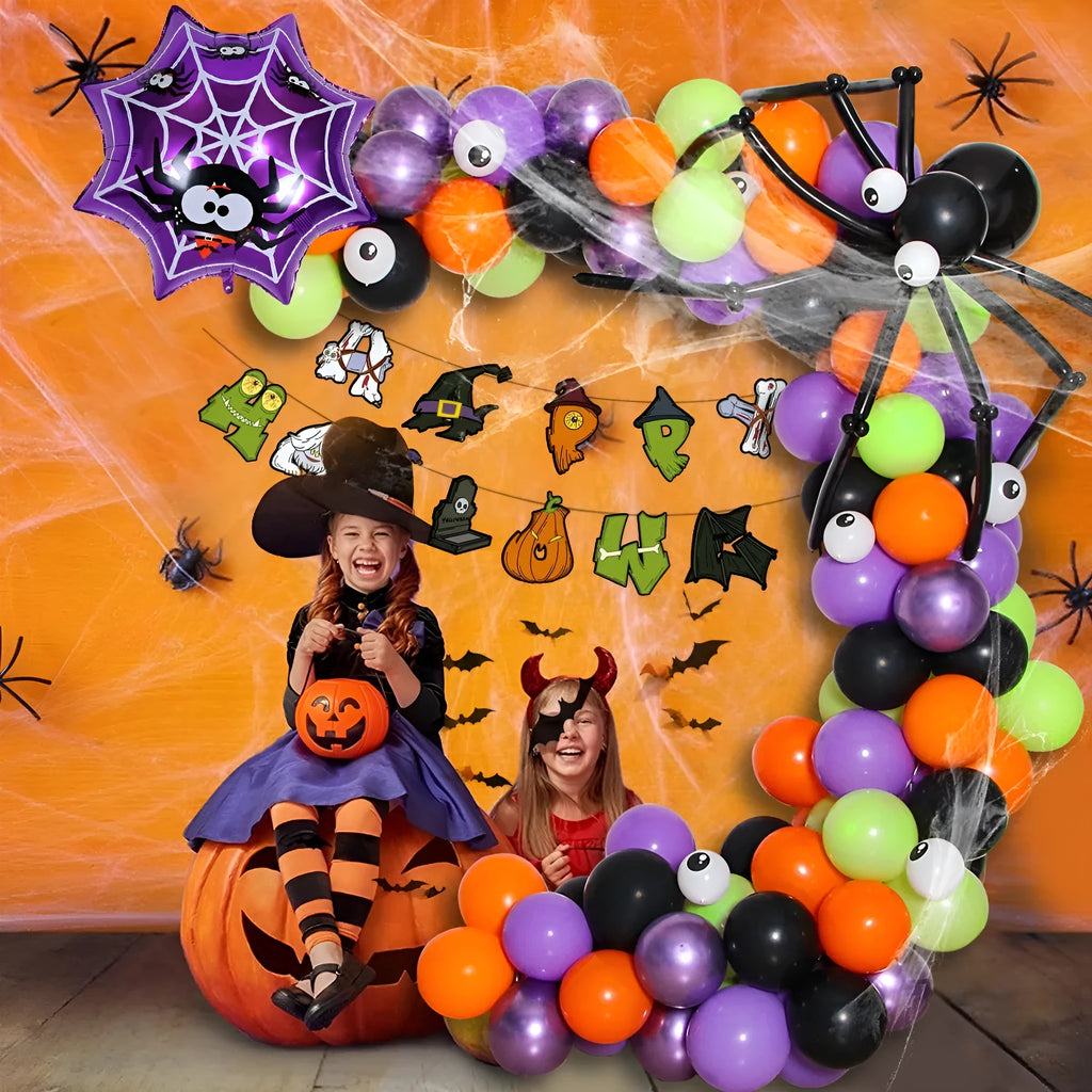 Black and white Halloween balloons with skull and pumpkin designs arranged as spider arch decoration