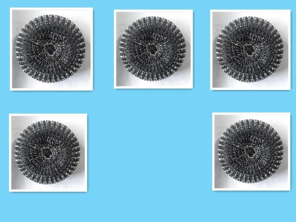 Kitchen palm brush with integrated push-type soap dispenser and bristles for scrubbing.