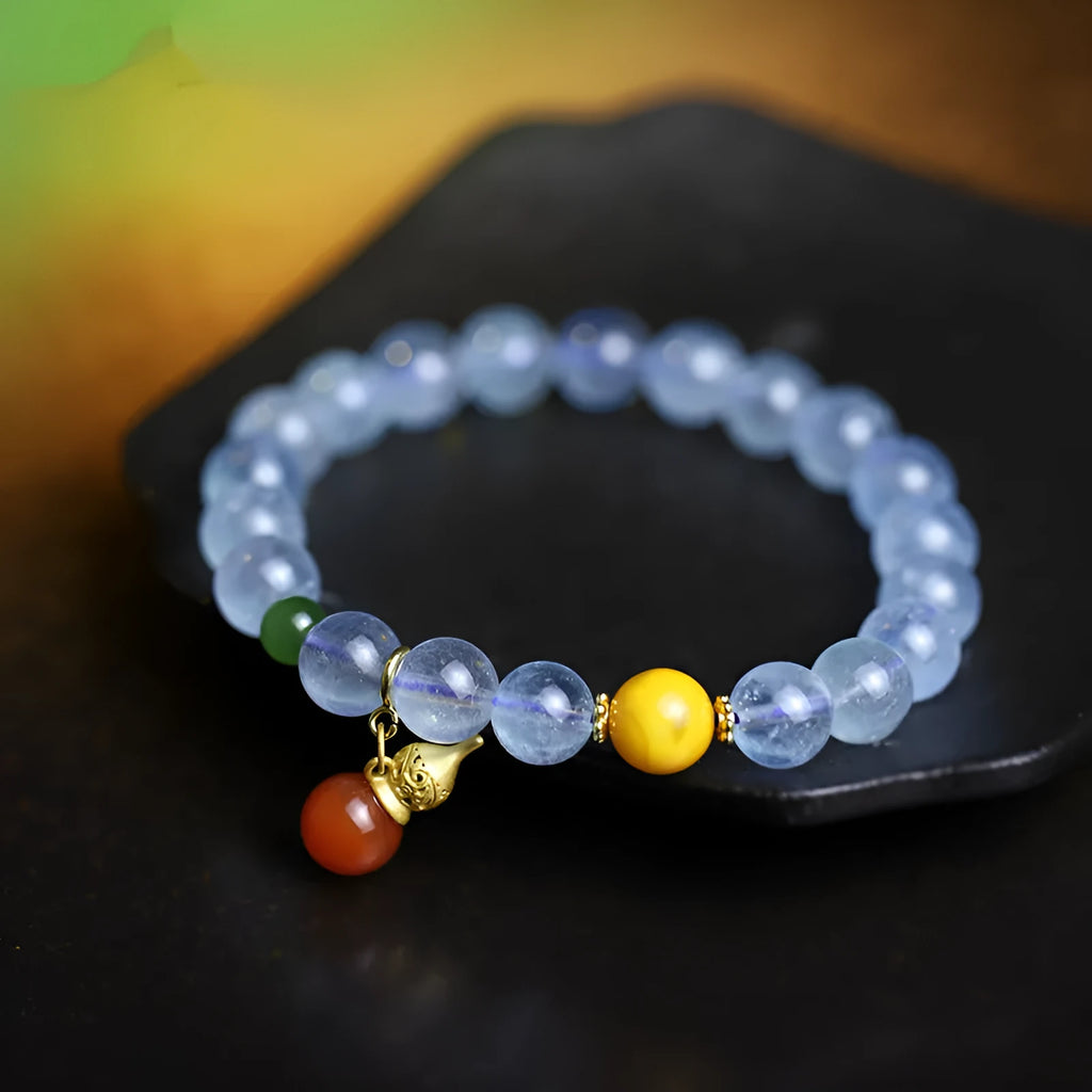 Women's bracelet with an 8mm geometric aquamarine crystal in an iced colour on a band.