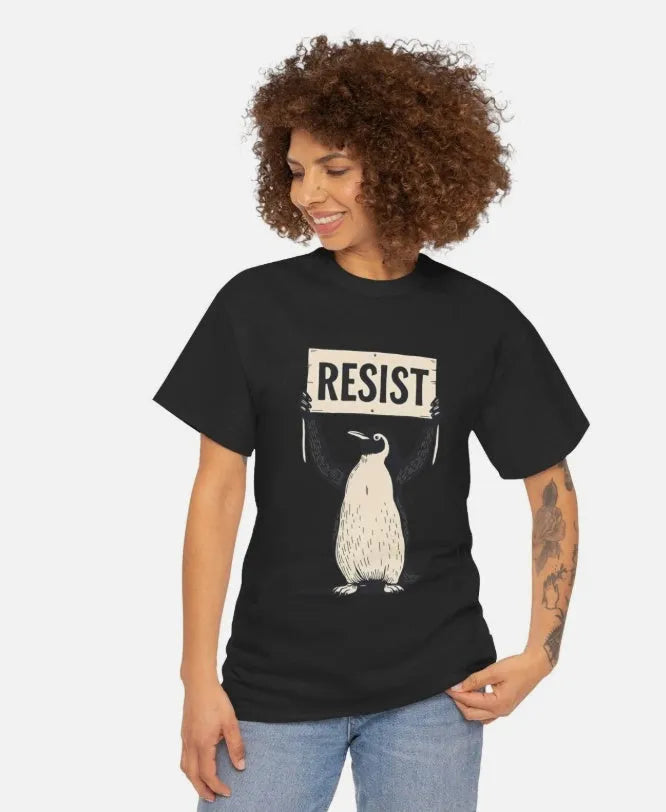 Straight-cut loose cotton T-shirt in black on a hanger, showing short sleeves and round neck.