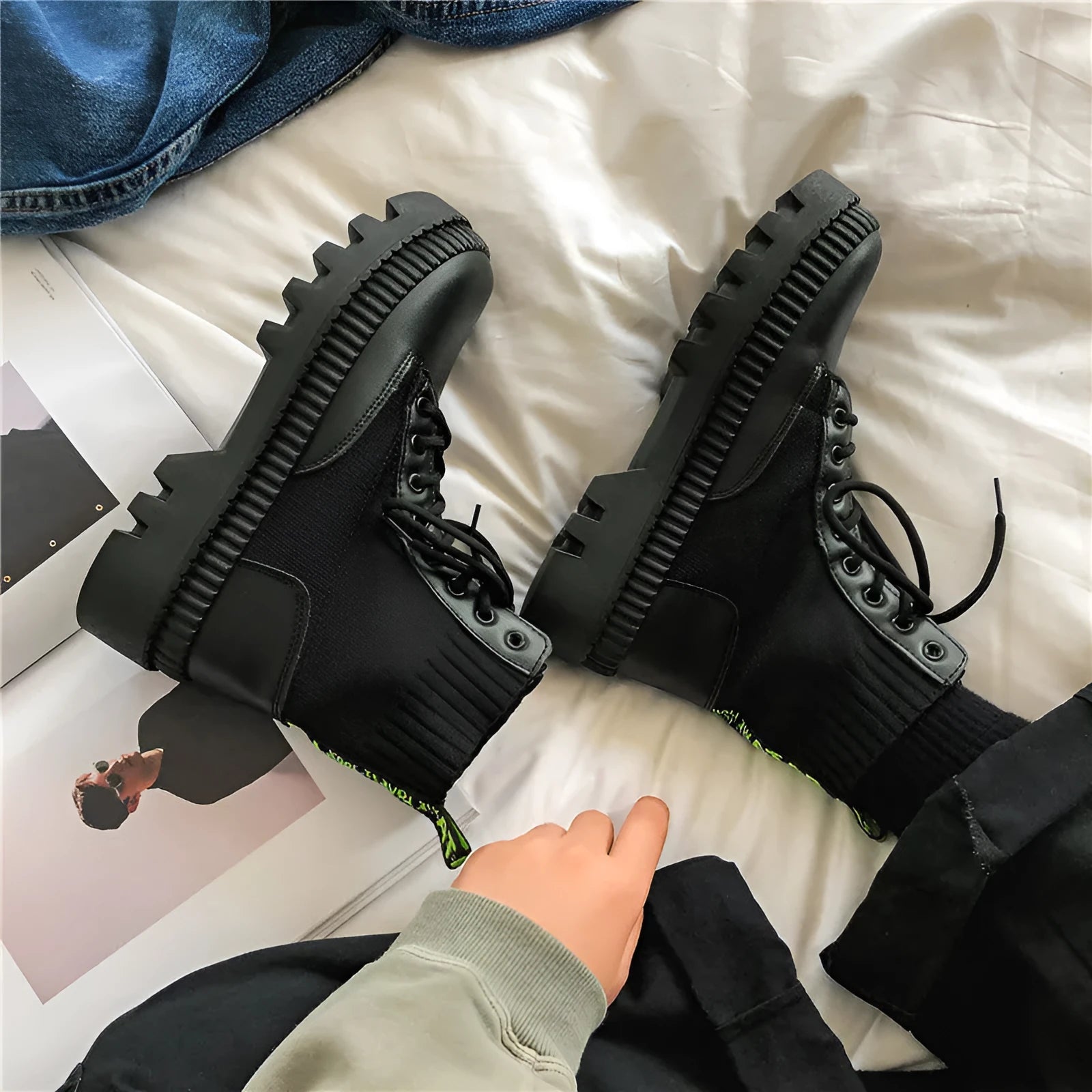 Men's black platform Doc Martens boots with side zipper, frosted cowhide leather upper, and rubber sole.