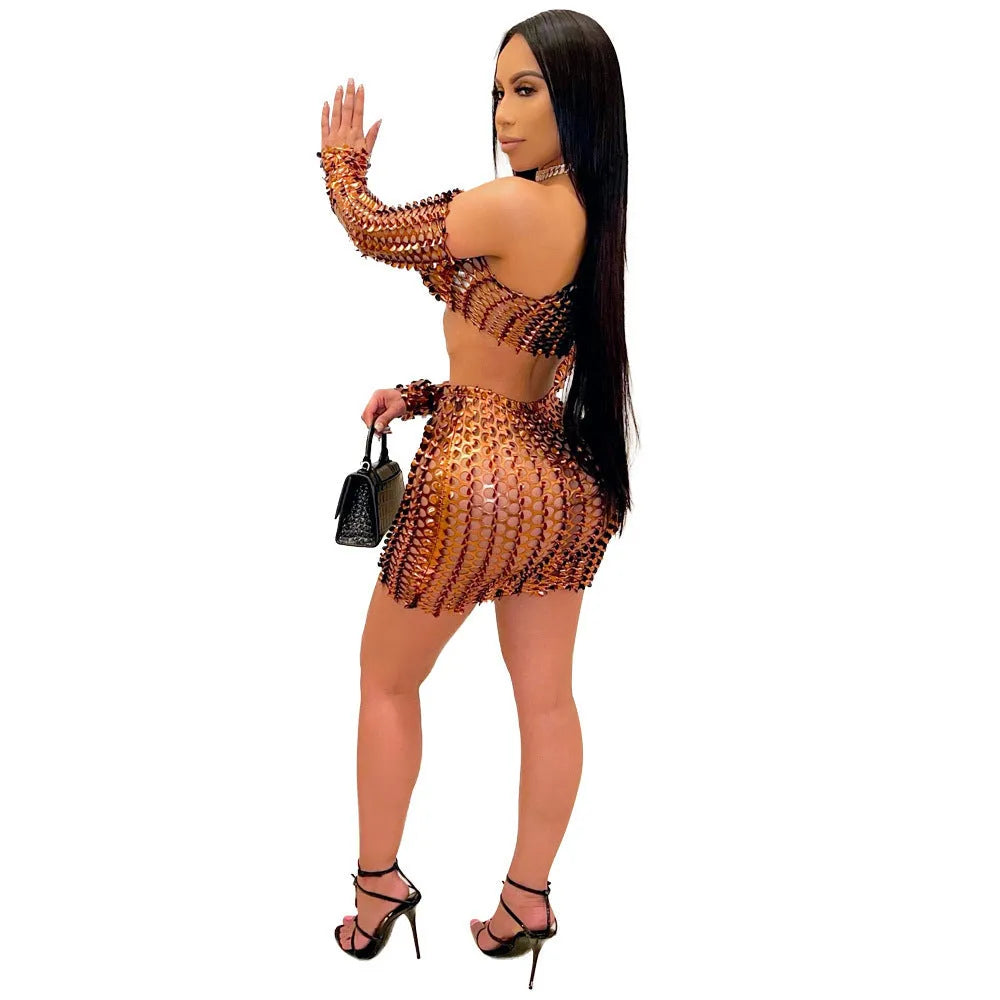 Hollow-out net two-piece dress set with sleeveless top and short skirt in polyester fabric