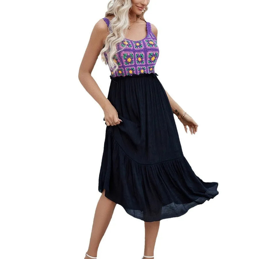 Purple sleeveless dress with hand-hooked white floral stitching pattern on the front.