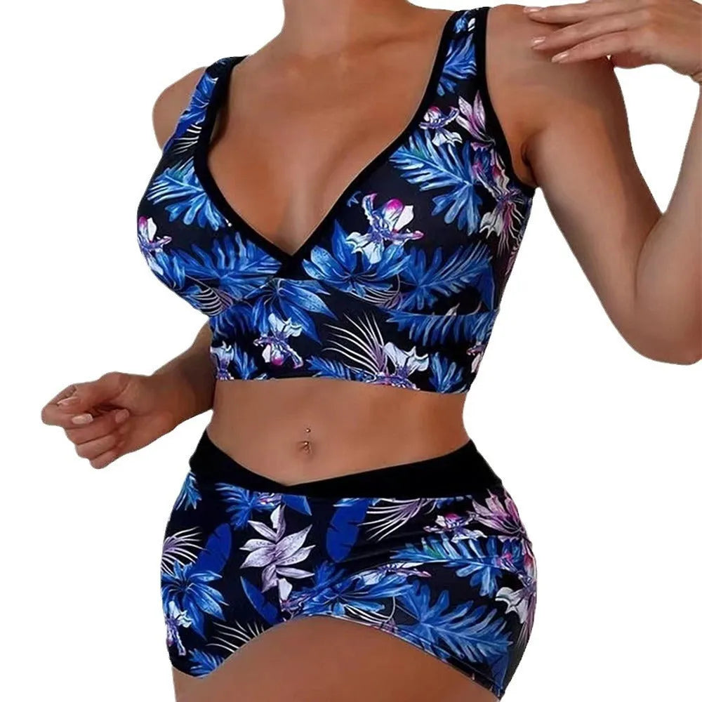 Women's two-piece swimsuit set showing sleeveless top and matching printed boxer shorts in a floral pattern.
