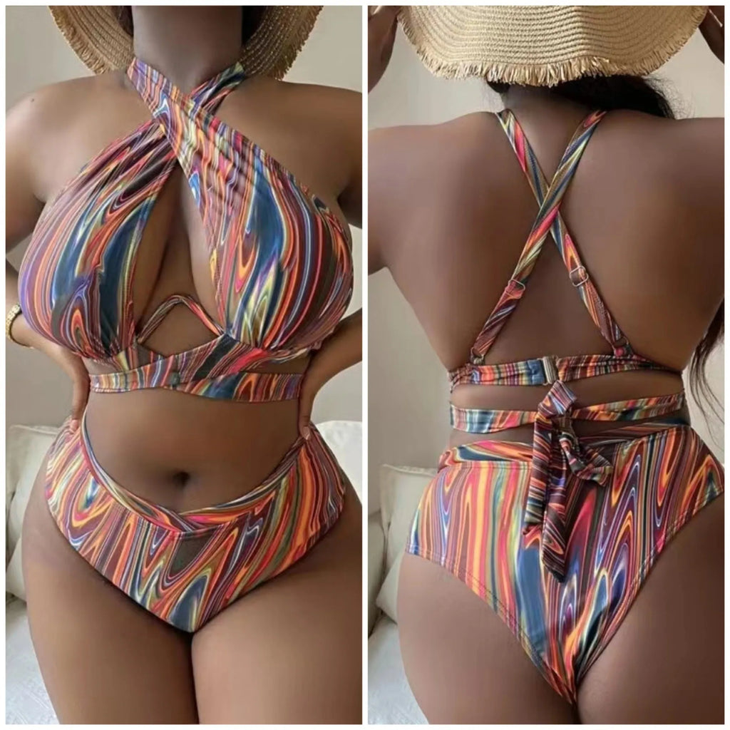 Women's floral high-waist bikini swimsuit top and pants in plus sizes.