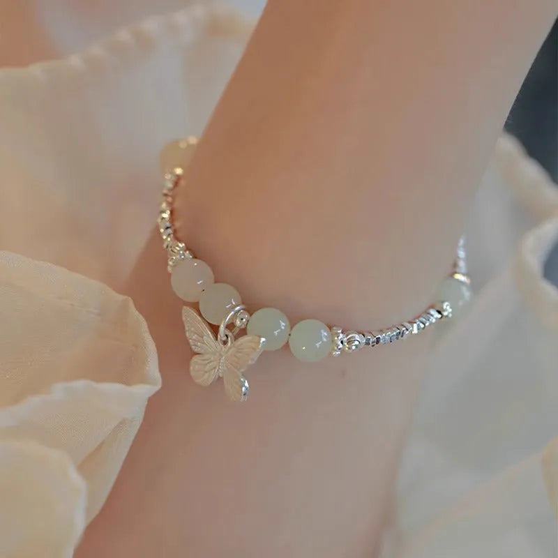 Women's Hetian jade bracelet and necklace set with silver butterfly charms on electroplated copper