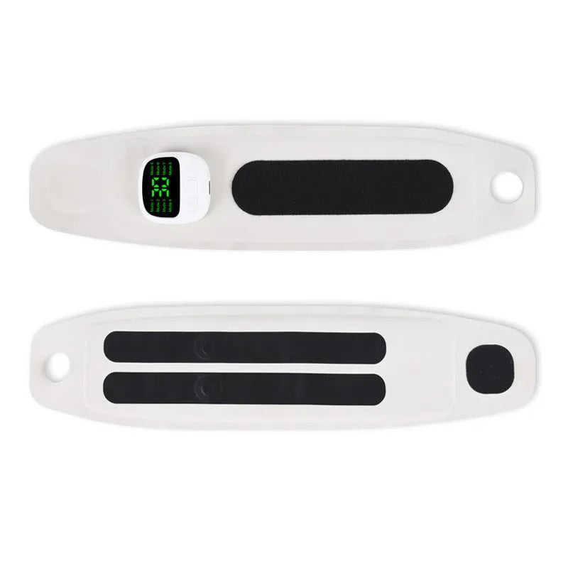 Adjustable hand massage instrument with coloured wristbands on a table