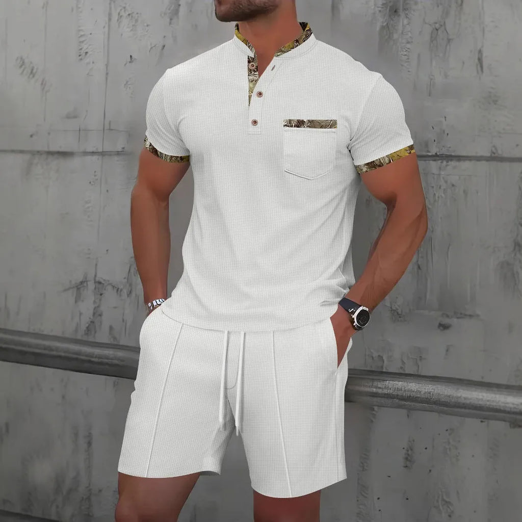 Men's grey short sleeve zip-front polo top and matching shorts on a hanger.