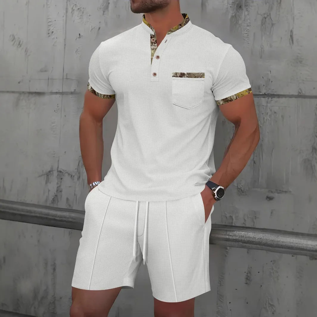 Men's grey short sleeve zip-front polo top and matching shorts on a hanger.