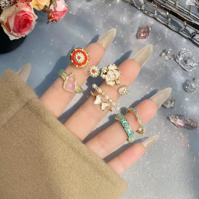 Adjustable copper gourd ring with vintage oil-drip finish and zircon inlay.