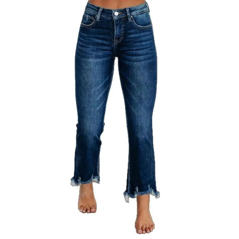 Women's dark blue denim casual trousers with a hand-distressed finish on a hanger.