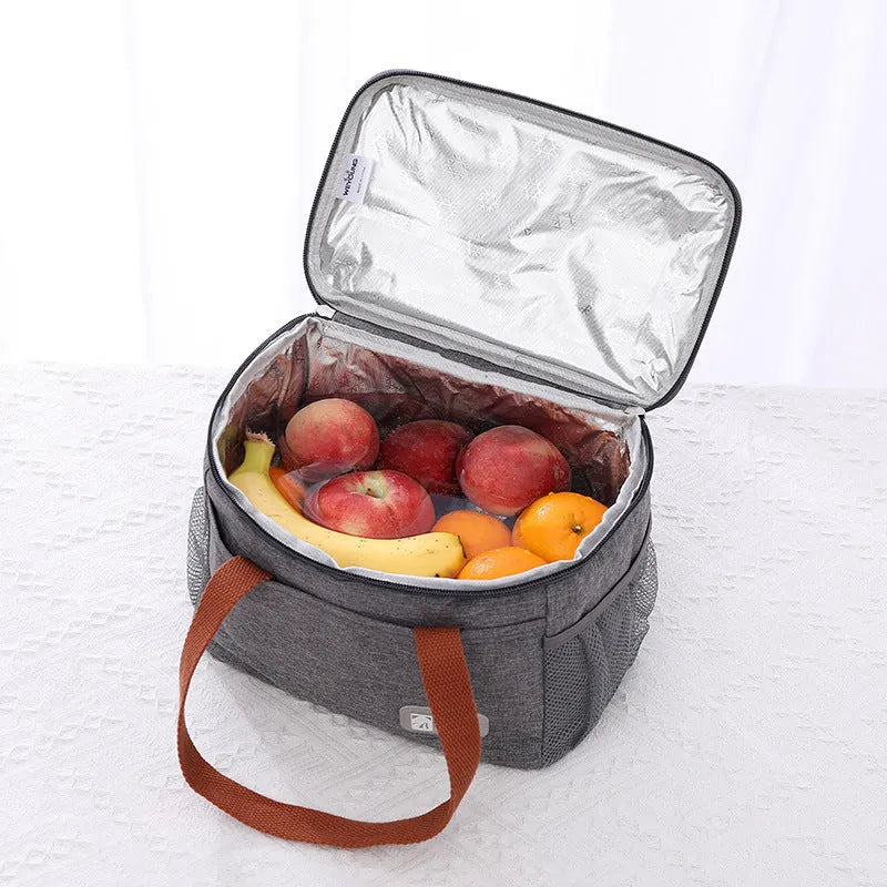 Insulated crossbody picnic bag with shoulder strap in grey colour showing 15 litre capacity