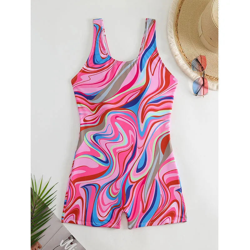Women's printed high-waisted backless one-piece swimsuit in polyester fabric on a mannequin.