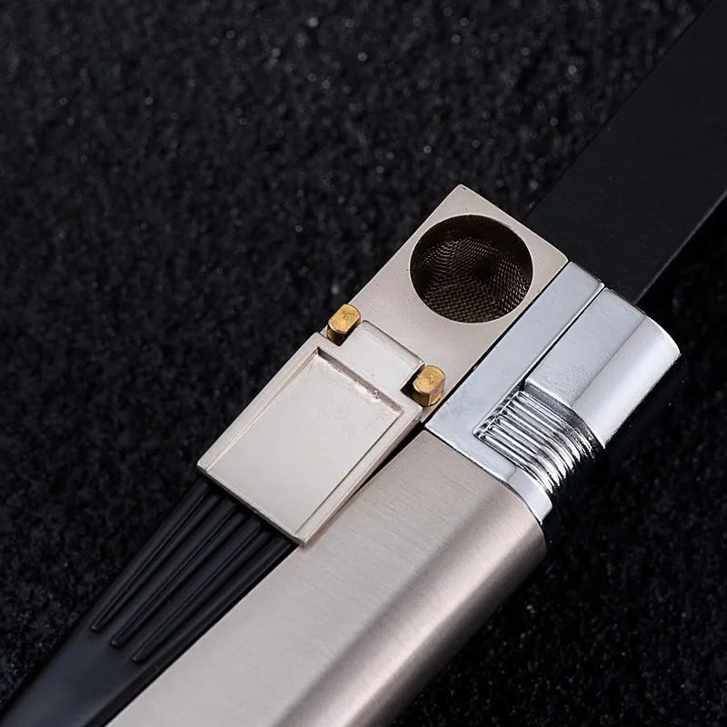 Silver foldable metal pipe lighter in open position showing flame mechanism and storage compartment.