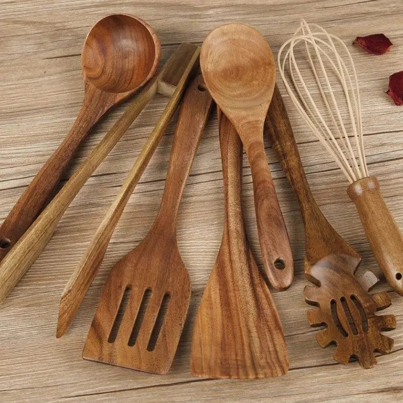 Seven wooden spoon shovels arranged together as a cooking utensil set for non-stick pans