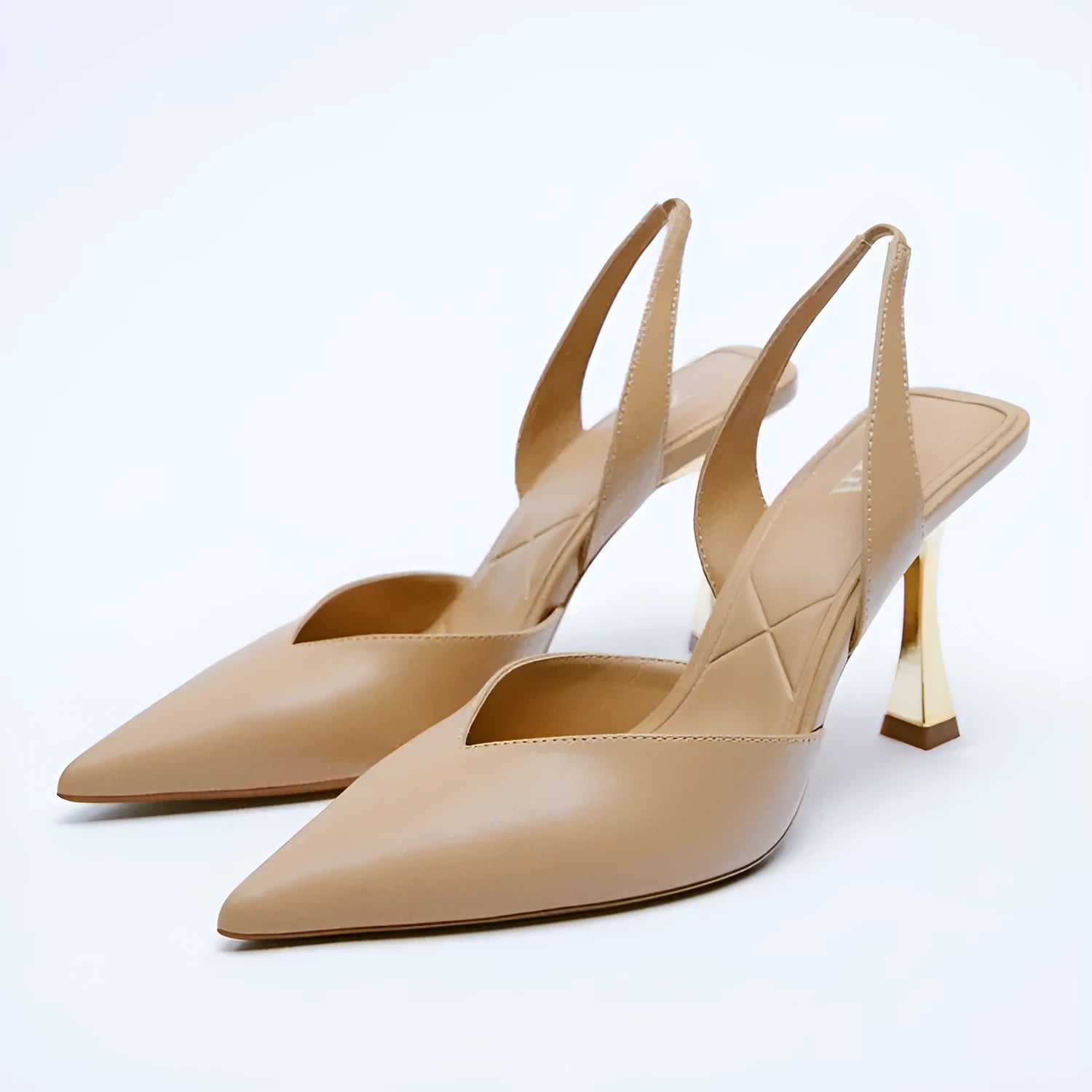 Women's nude pointed high heels in patent leather, shown in black and apricot colours with a shallow mouth design.