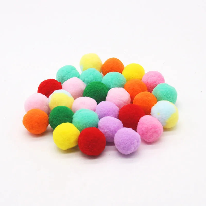 A 30cm long plush ball launcher gun for pets with a selection of soft 3cm yarn balls.