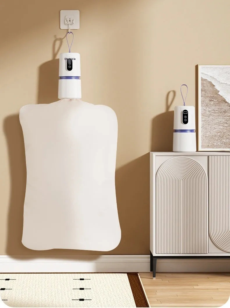 White cylindrical mini household air dryer with PTC heating, 85x85x166mm, includes drying bag