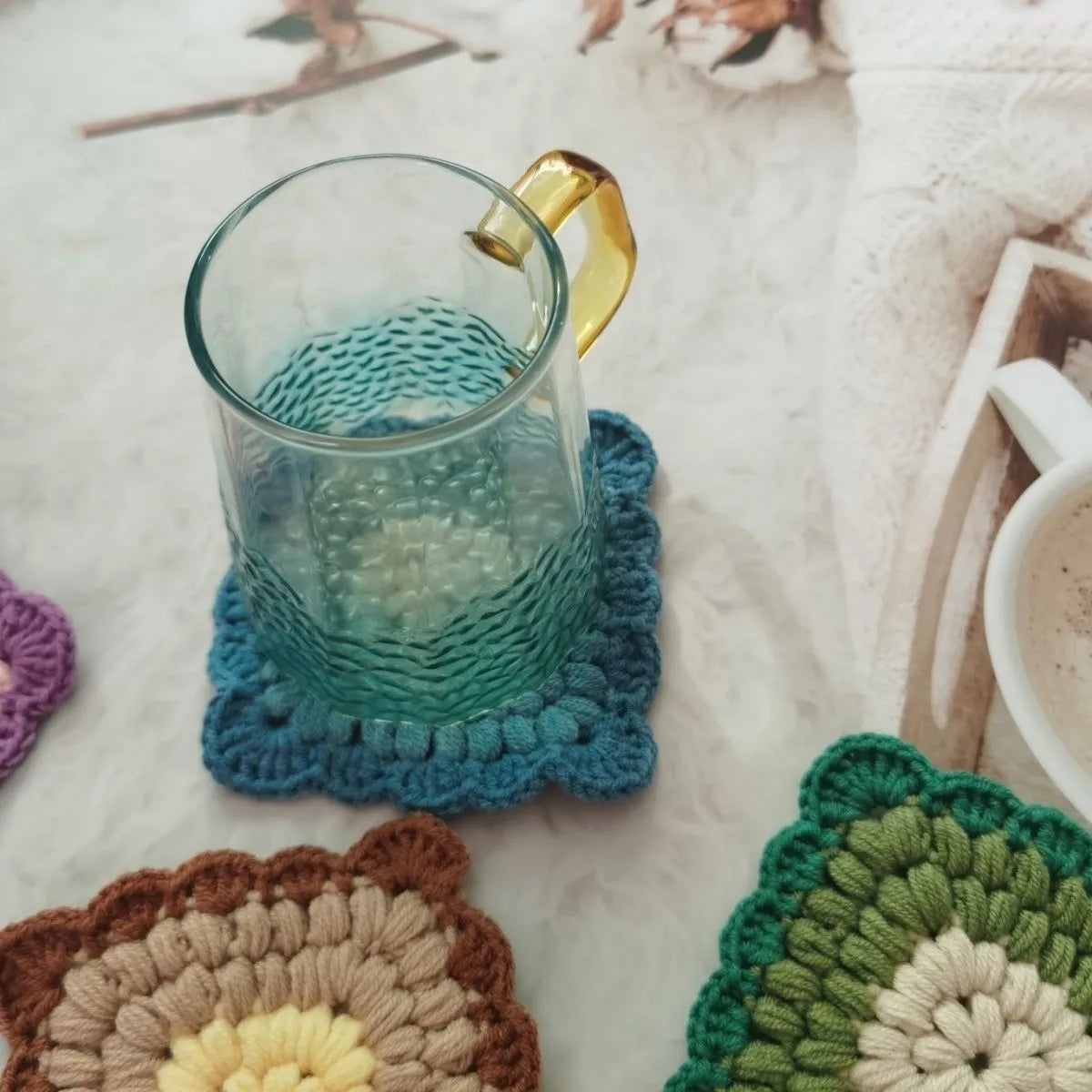 Crocheted wool insulated cup placemat with grandmother lattice pattern in colour choice