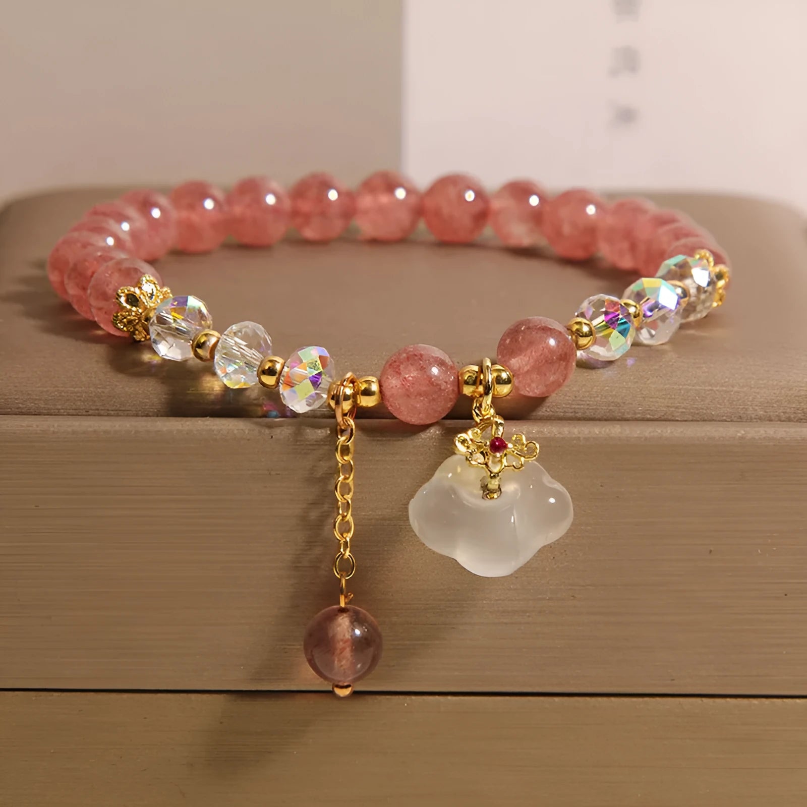 Women's natural strawberry quartz and white agate crystal bracelet with auspicious cloud pattern on elastic string