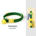 A simple, solid-colour elastic pet collar for small dogs, laid flat on a surface.