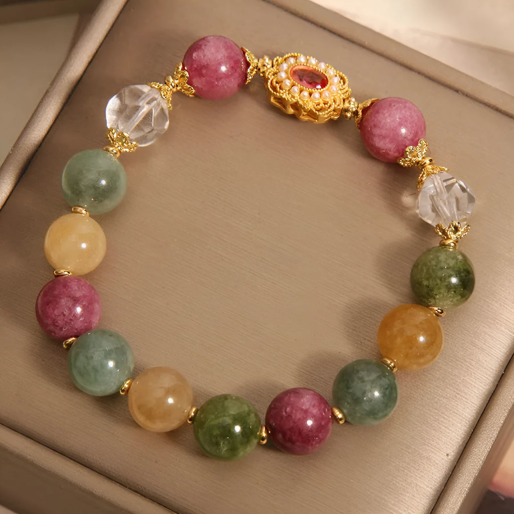 Women's alloy bracelet with colour tourmaline round beads on a pearl crystal base and rhinestone details.