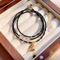 Blue gold three-ring women's bracelet with blue sand stone gemstone on adjustable fastening