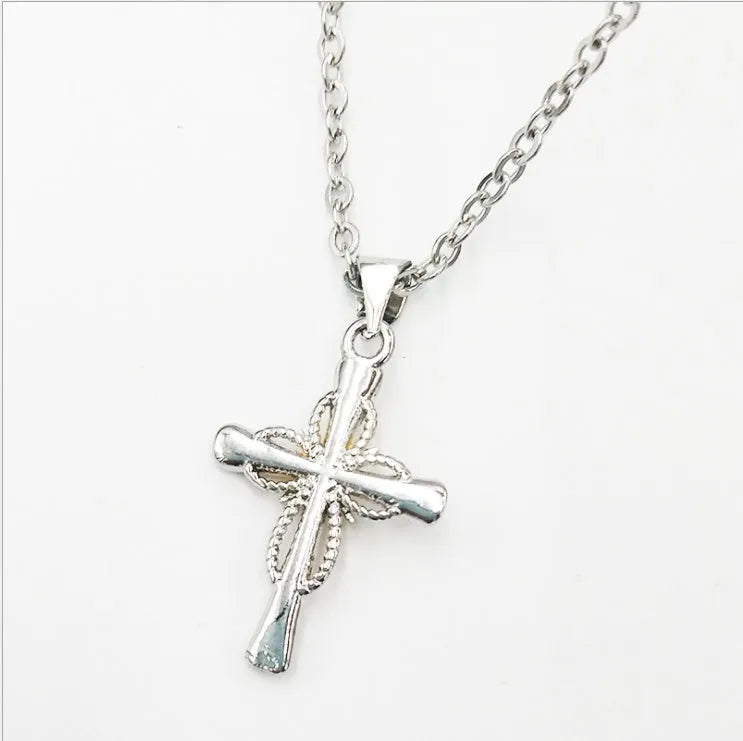 Silver alloy cross pendant with octagonal star detail on ring chain, 22x15mm size