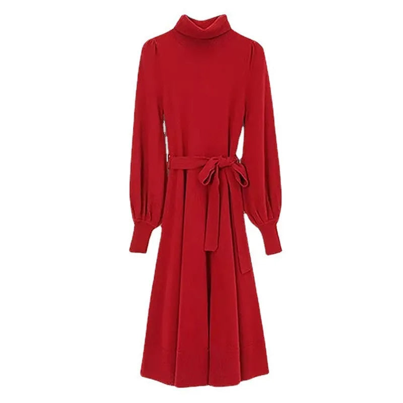 Rose red turtleneck knit dress with long sleeves, elastic waist, and a flared midi-length skirt.
