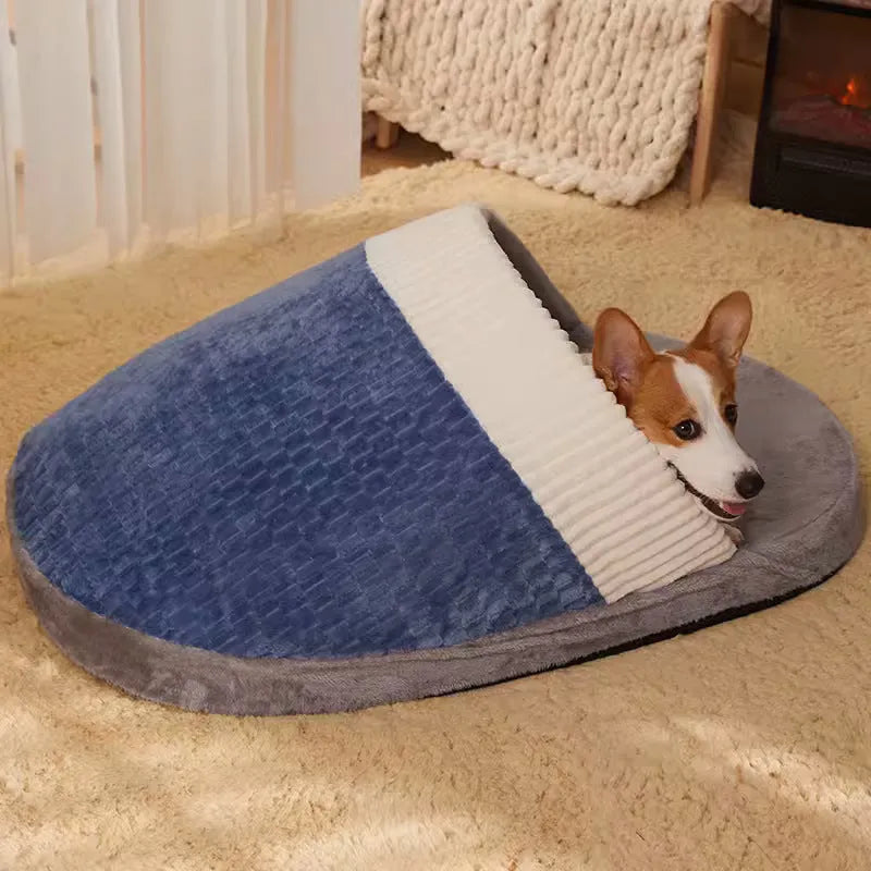 Blue dog nest sleeping bag with removable cover, shown in a medium size.